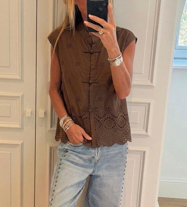 Brown eyelet sleeveless blouse